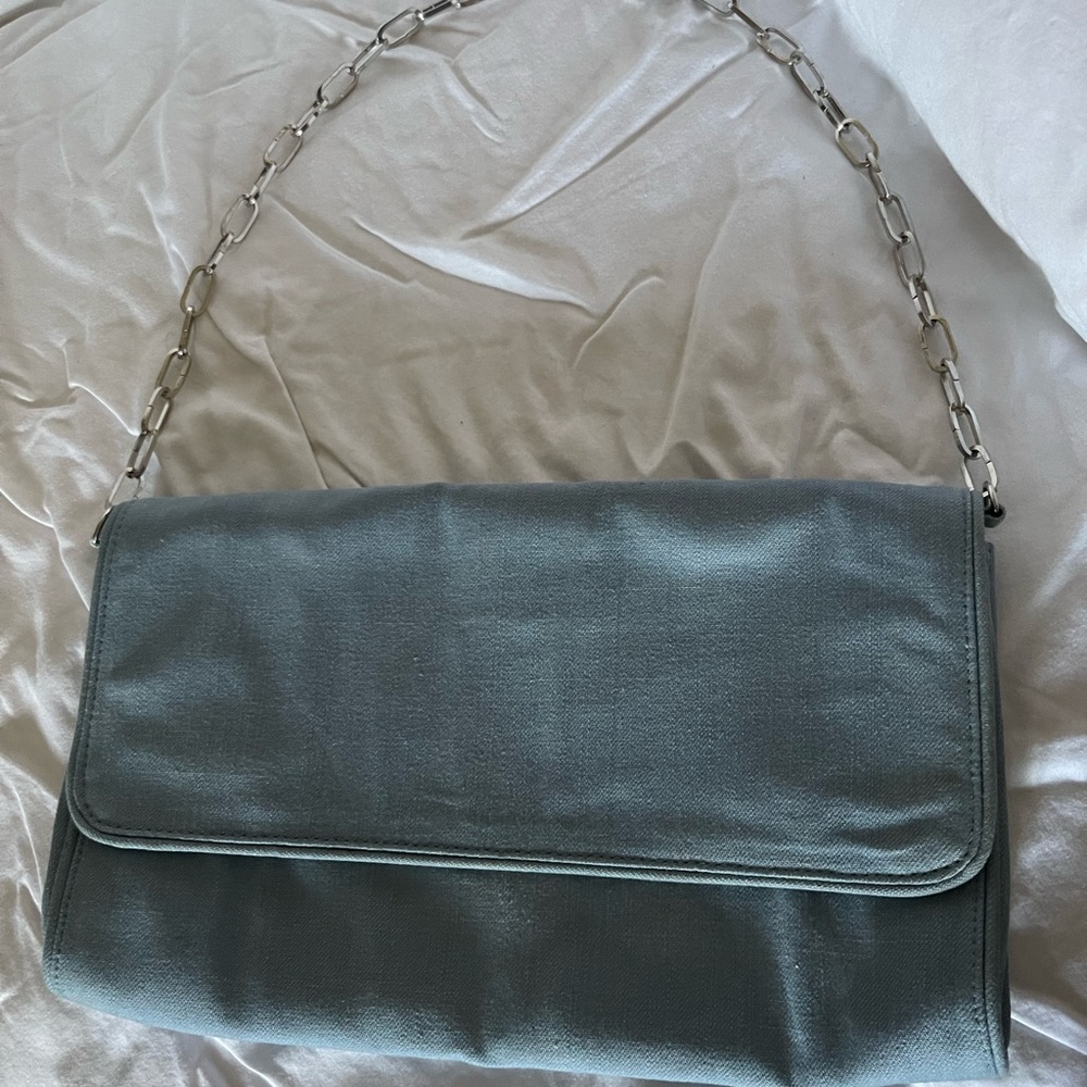 United colors of Benetton shoulder bag/clutch.Iight blue denim. Gently used.